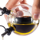 Illustration for article titled This Oil and Vinegar Dispenser Stores One Inside of the Other